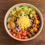Low-carb burger bowl recipe with fresh toppings
